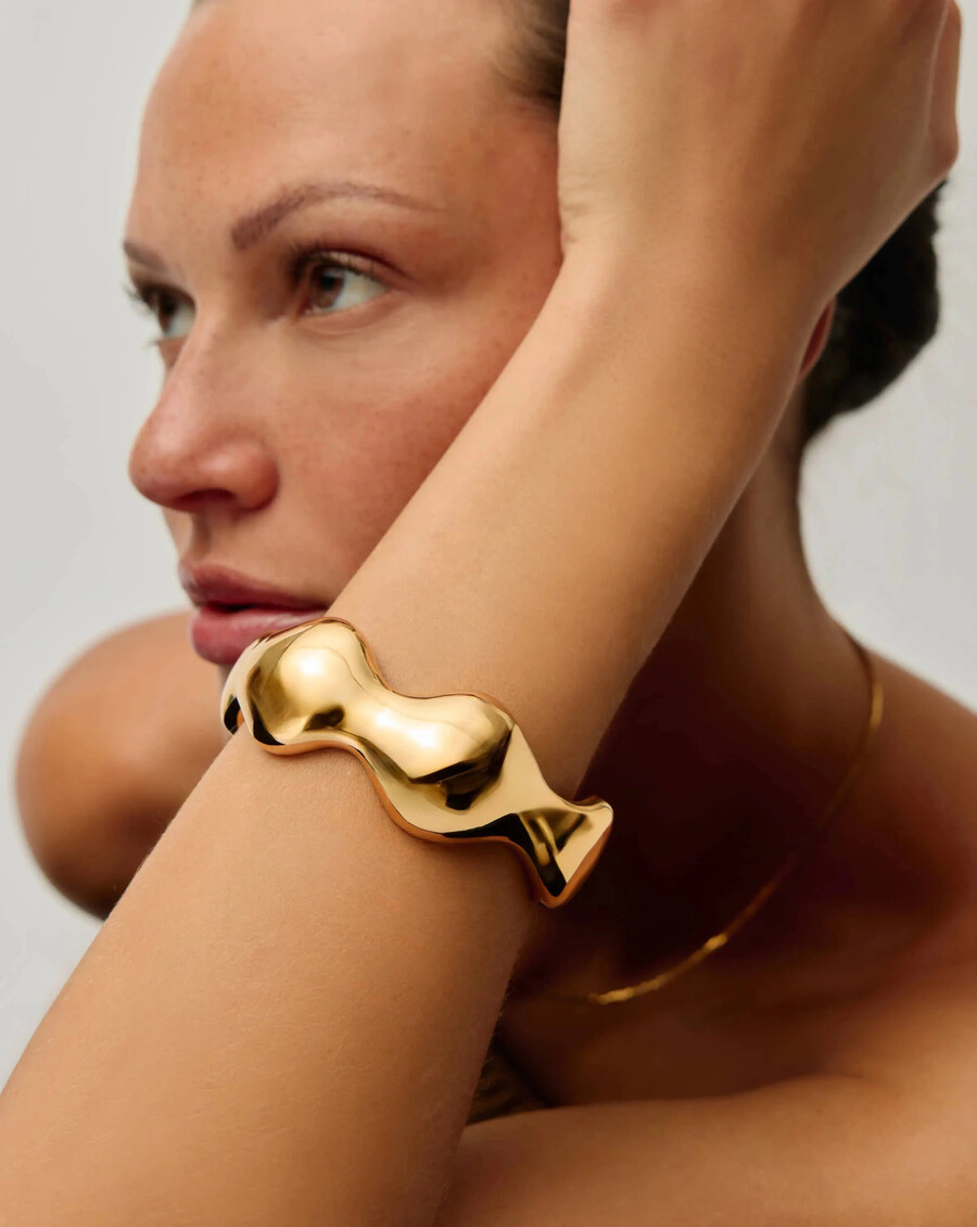brazalete con diseño de cúpula abultada eny - dorado