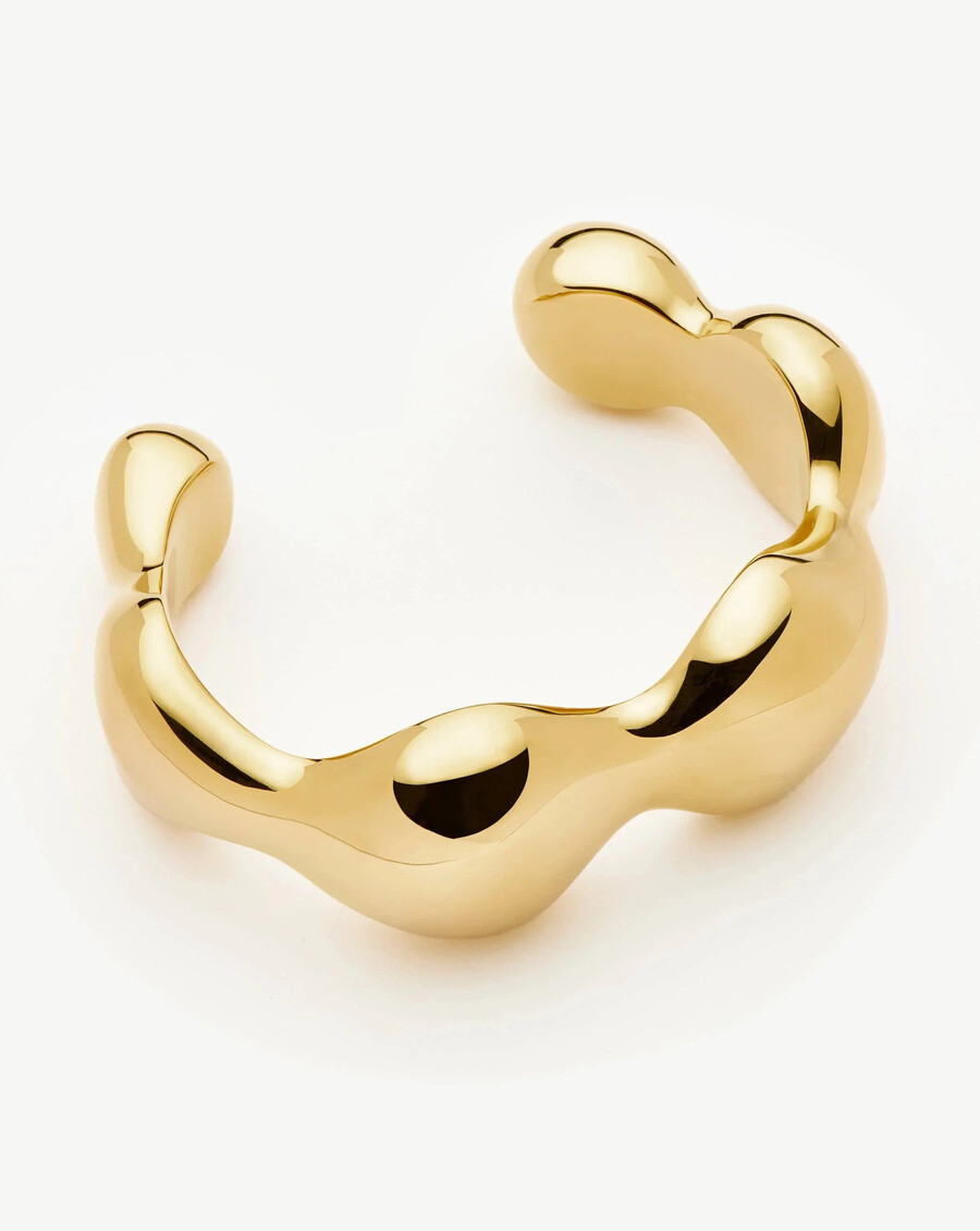 brazalete con diseño de cúpula abultada eny - dorado