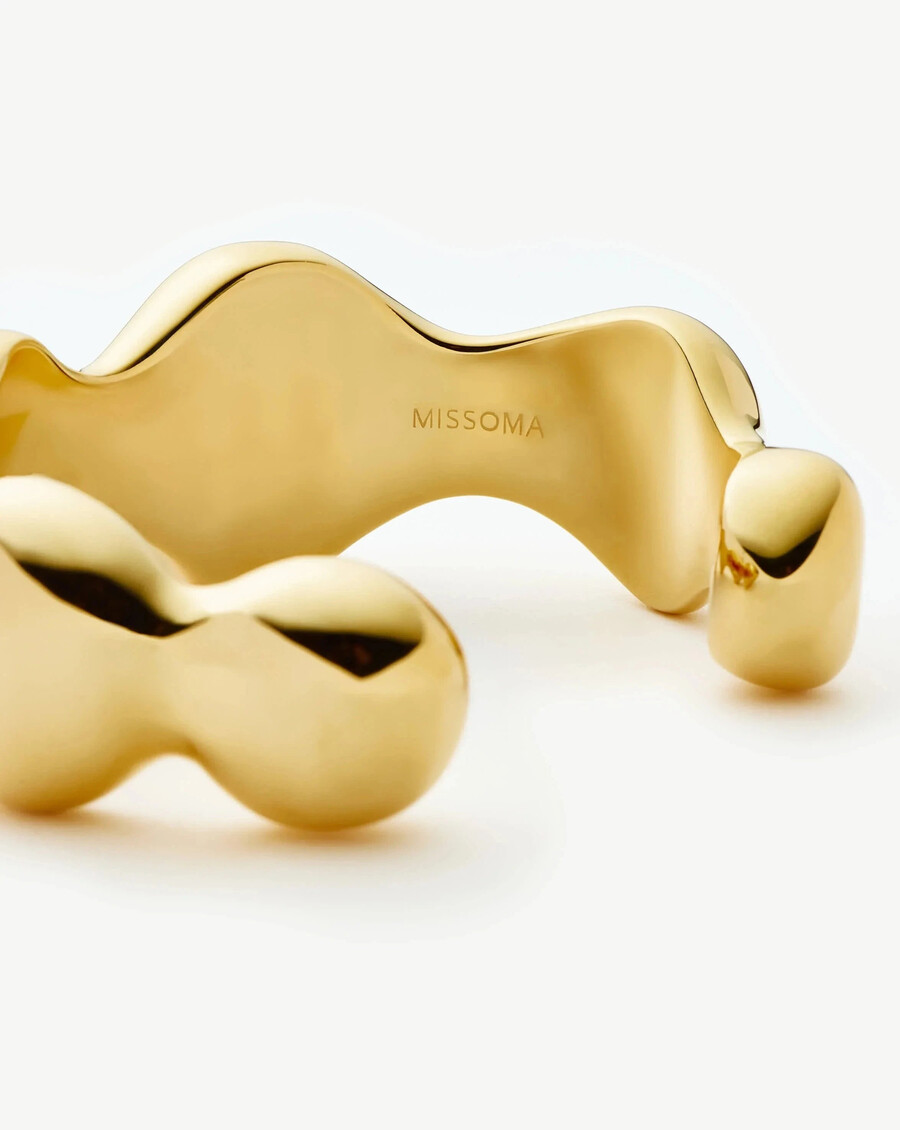 brazalete con diseño de cúpula abultada eny - dorado