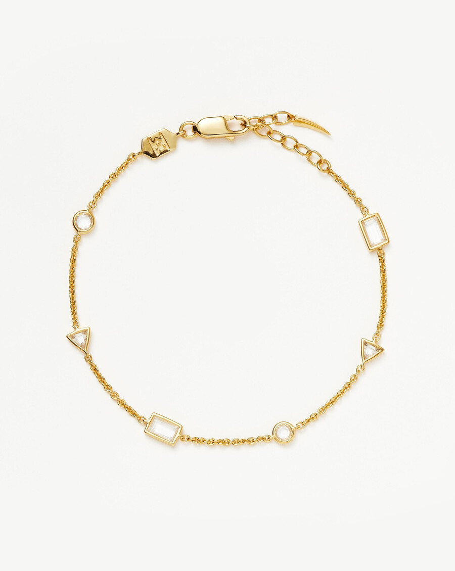 pulsera con dije de piedra flotante - oro