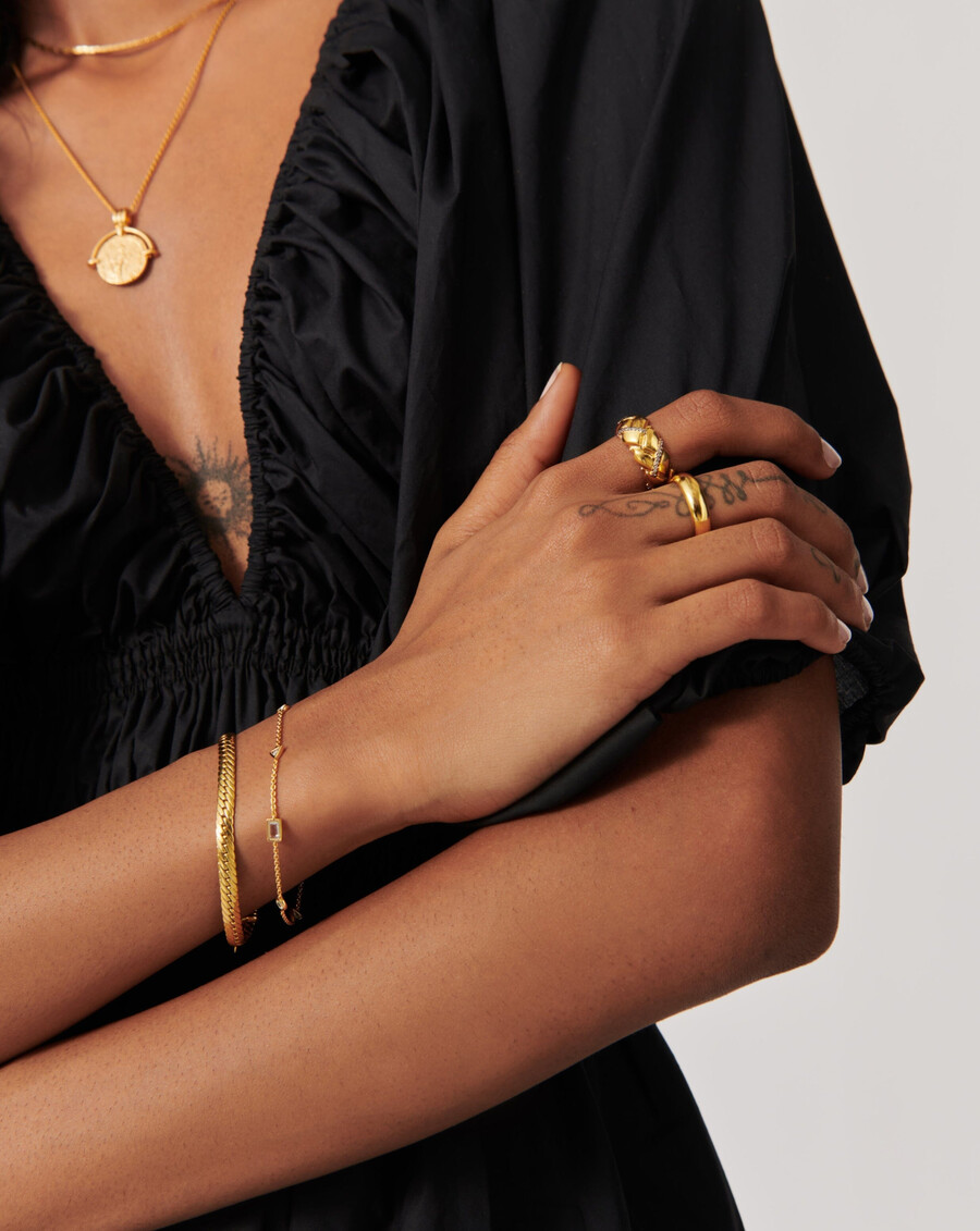 pulsera con dije de piedra flotante - oro