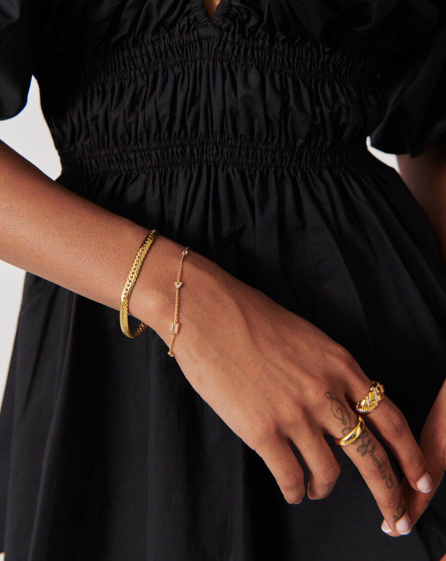 pulsera con dije de piedra flotante - oro