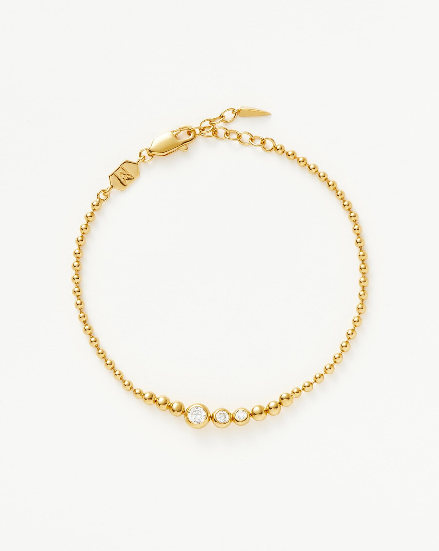 pulsera de cuentas de piedra - oro
