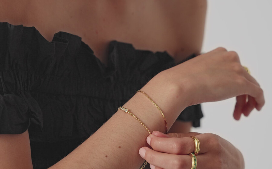 pulsera de cuentas de piedra - oro