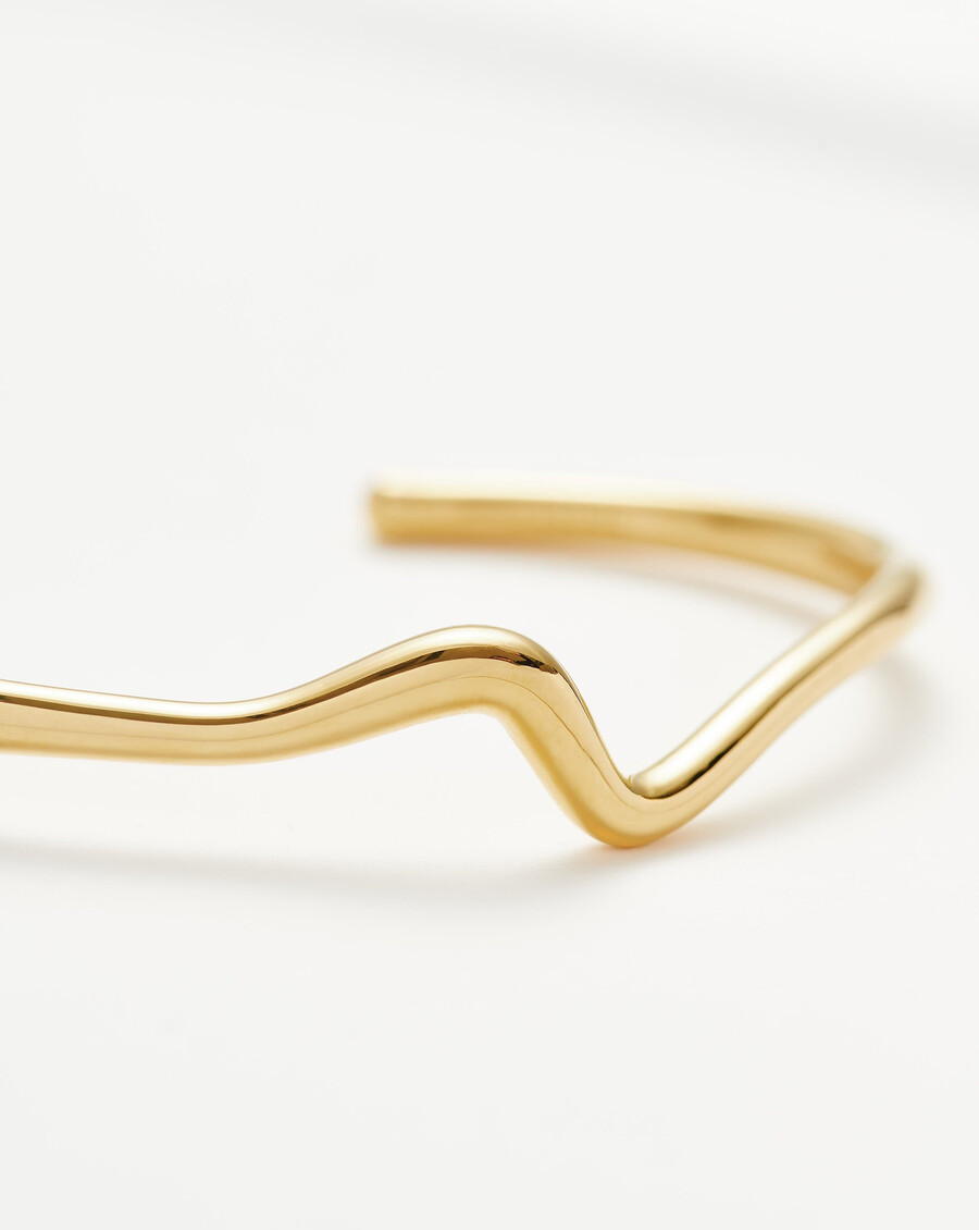 pulsera de oro con ondas fundidas