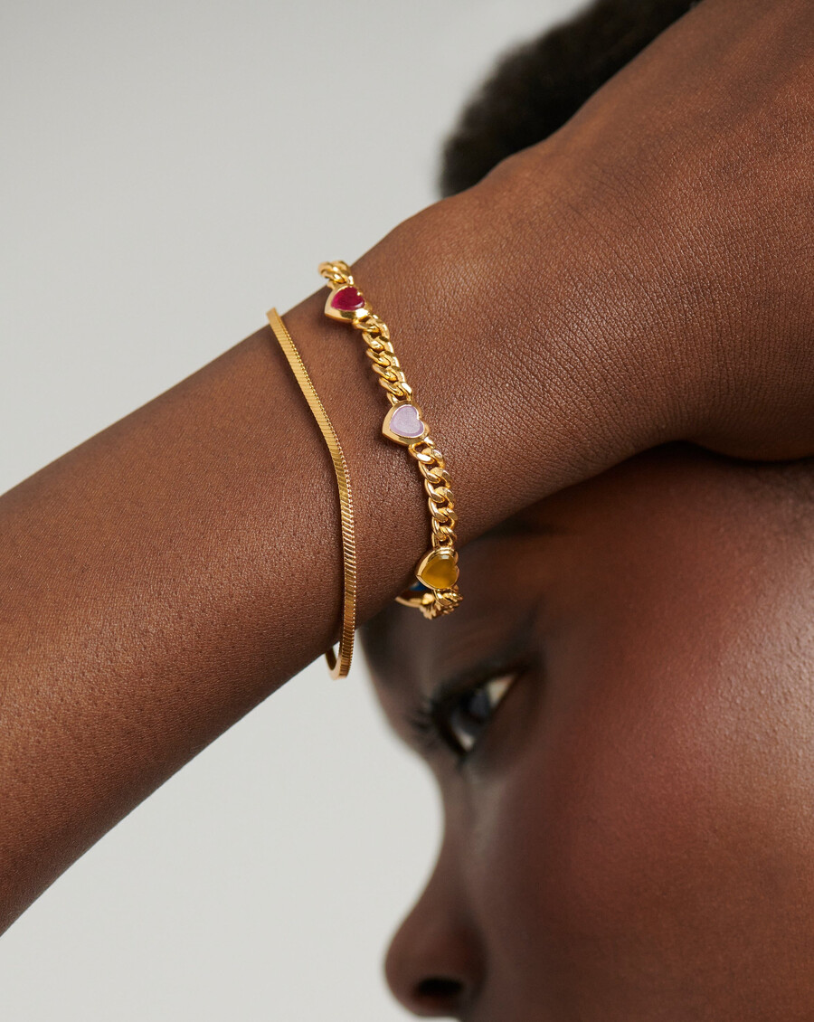 pulsera con dije de piedras preciosas y corazón de gelatina