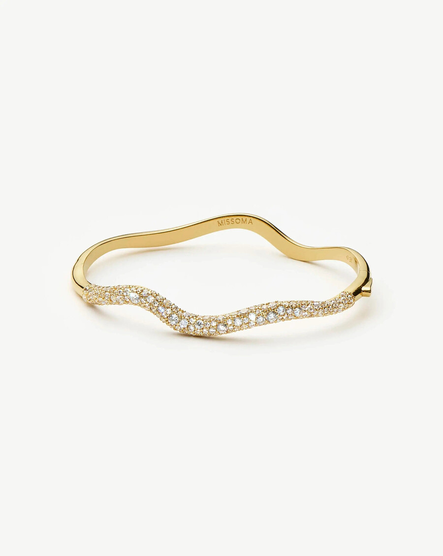 brazalete con bisagras de ondas de nieve fundida - oro
