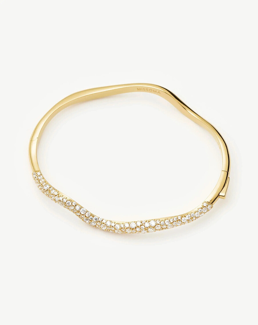 brazalete con bisagras de ondas de nieve fundida - oro