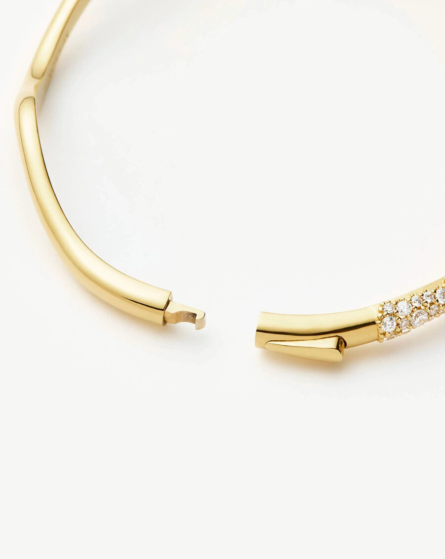 brazalete con bisagras de ondas de nieve fundida - oro