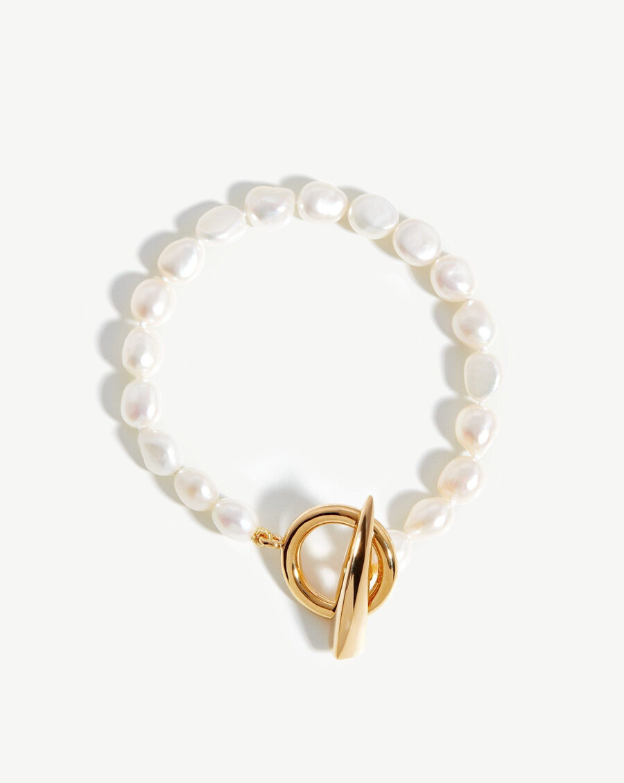 pulsera con barra en t y garra de perla barroca