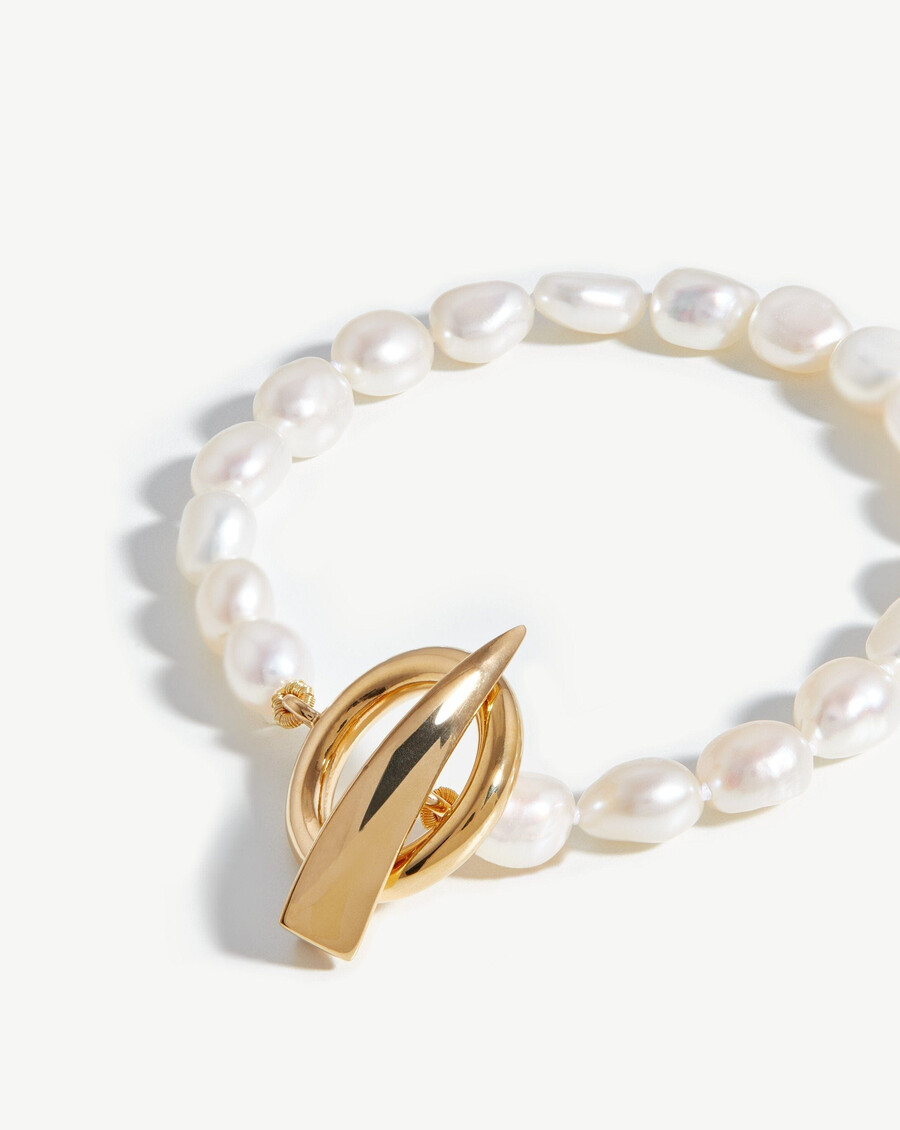 pulsera con barra en t y garra de perla barroca