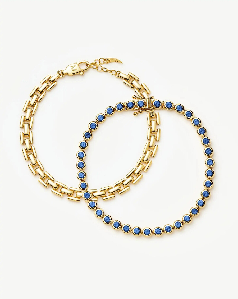 juego de pulseras de tenis y clip - doradoazul
