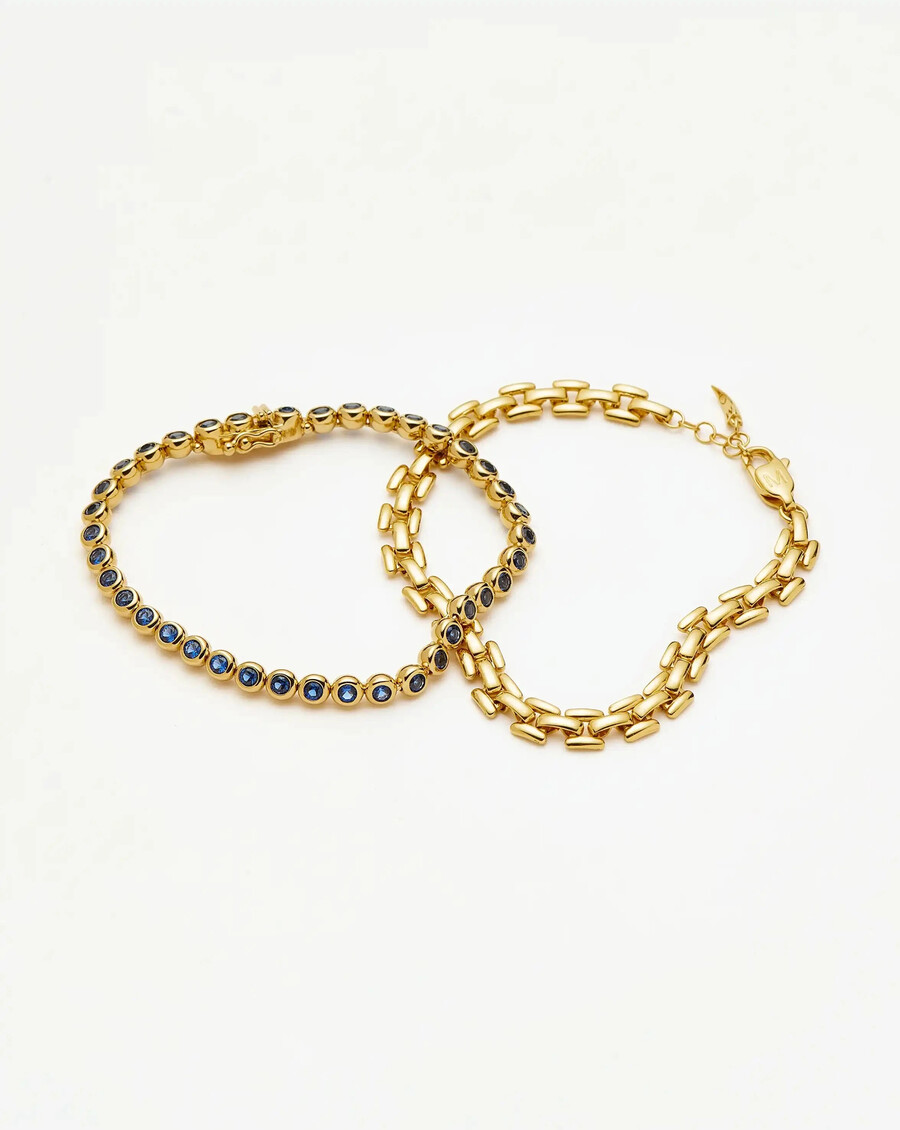 juego de pulseras de tenis y clip - doradoazul