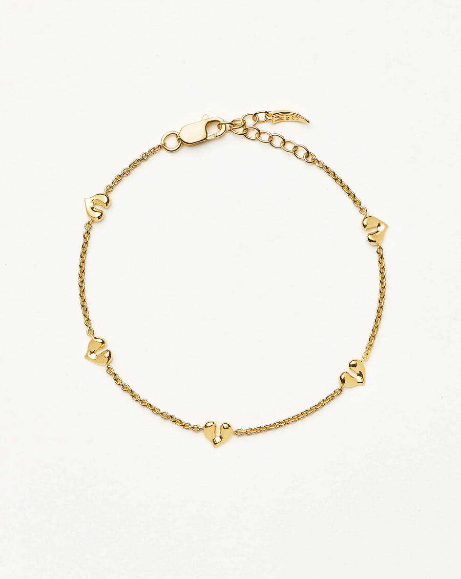 pulsera con mini dijes de corazón fundido