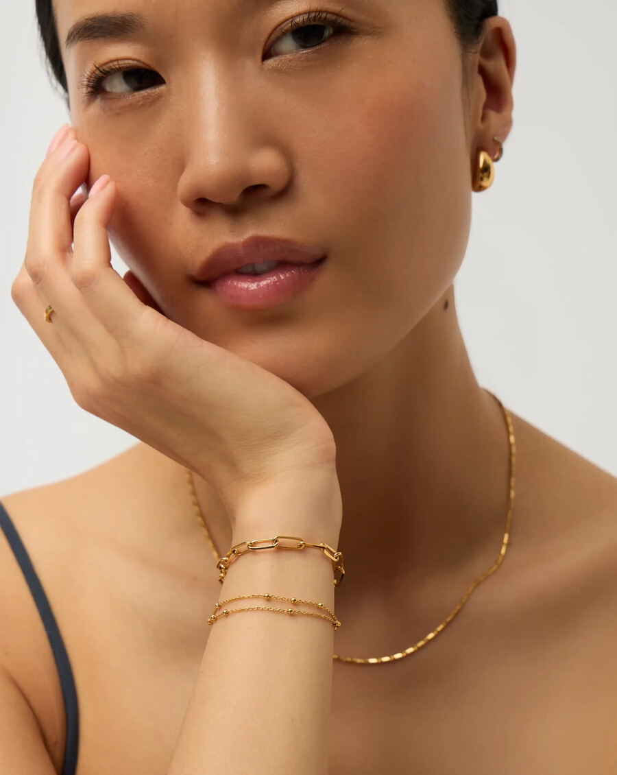pulsera de doble cadena - oro