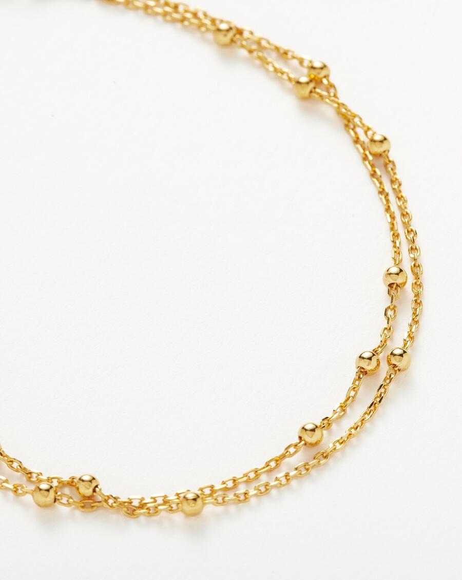 pulsera de doble cadena - oro