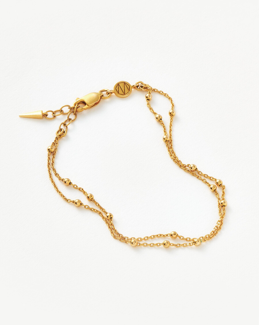 pulsera de doble cadena - oro
