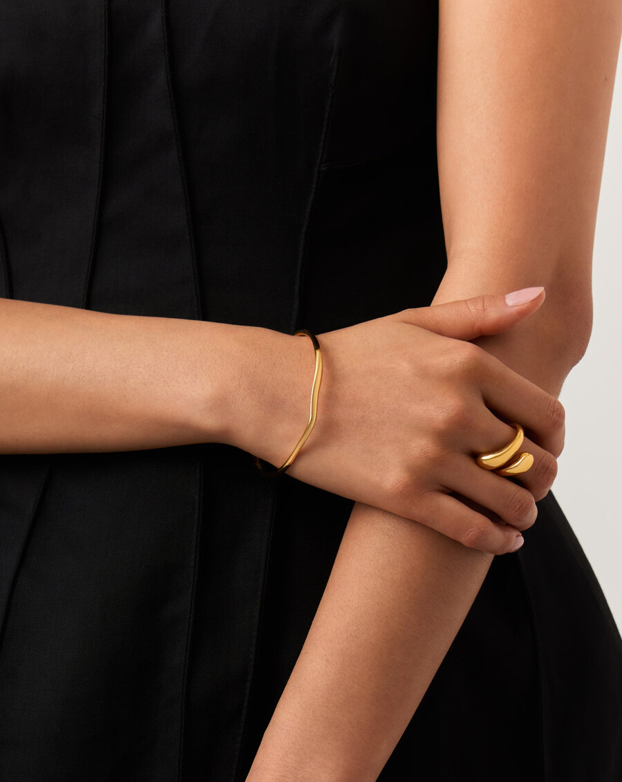 brazalete de ondas fundidas - oro