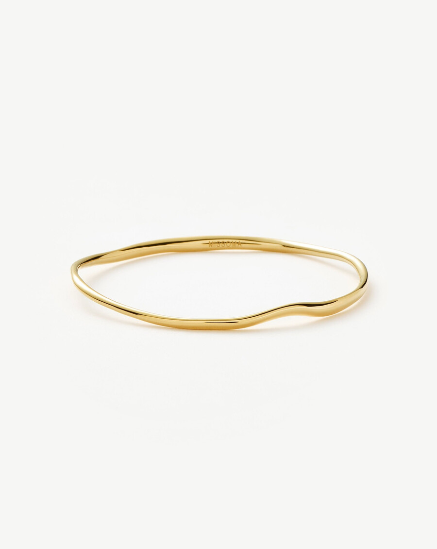 brazalete de ondas fundidas - oro