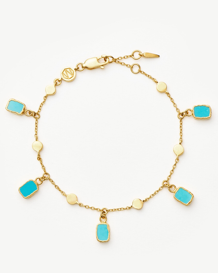 pulsera con dijes lena - oroturquesa