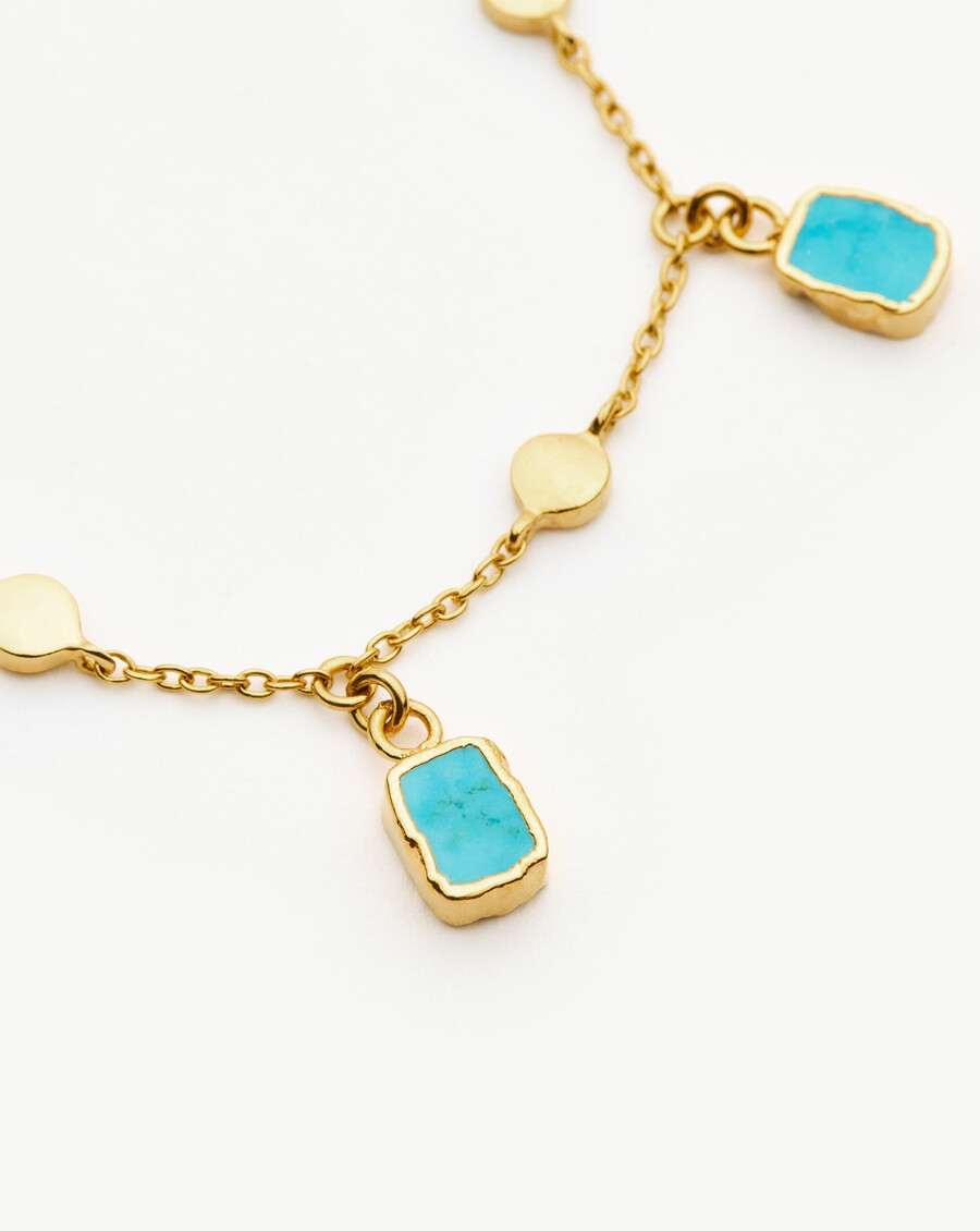 pulsera con dijes lena - oroturquesa