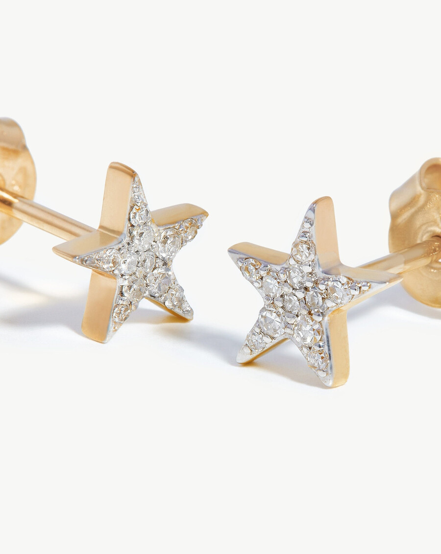 aretes pequeños con forma de estrella y diamantes en oro macizo de 14 k