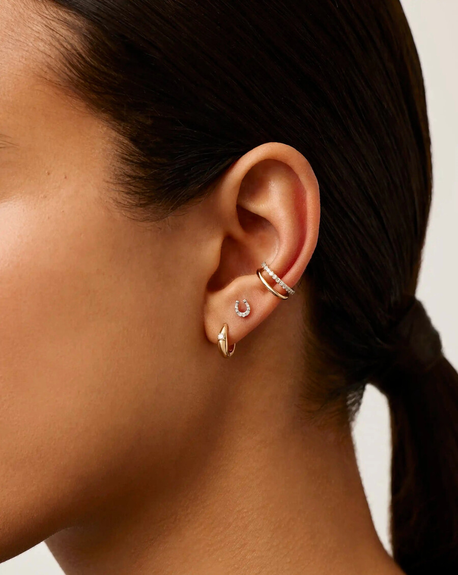 pendiente de botón con un solo diamante en forma de herradura de oro macizo de 14 k