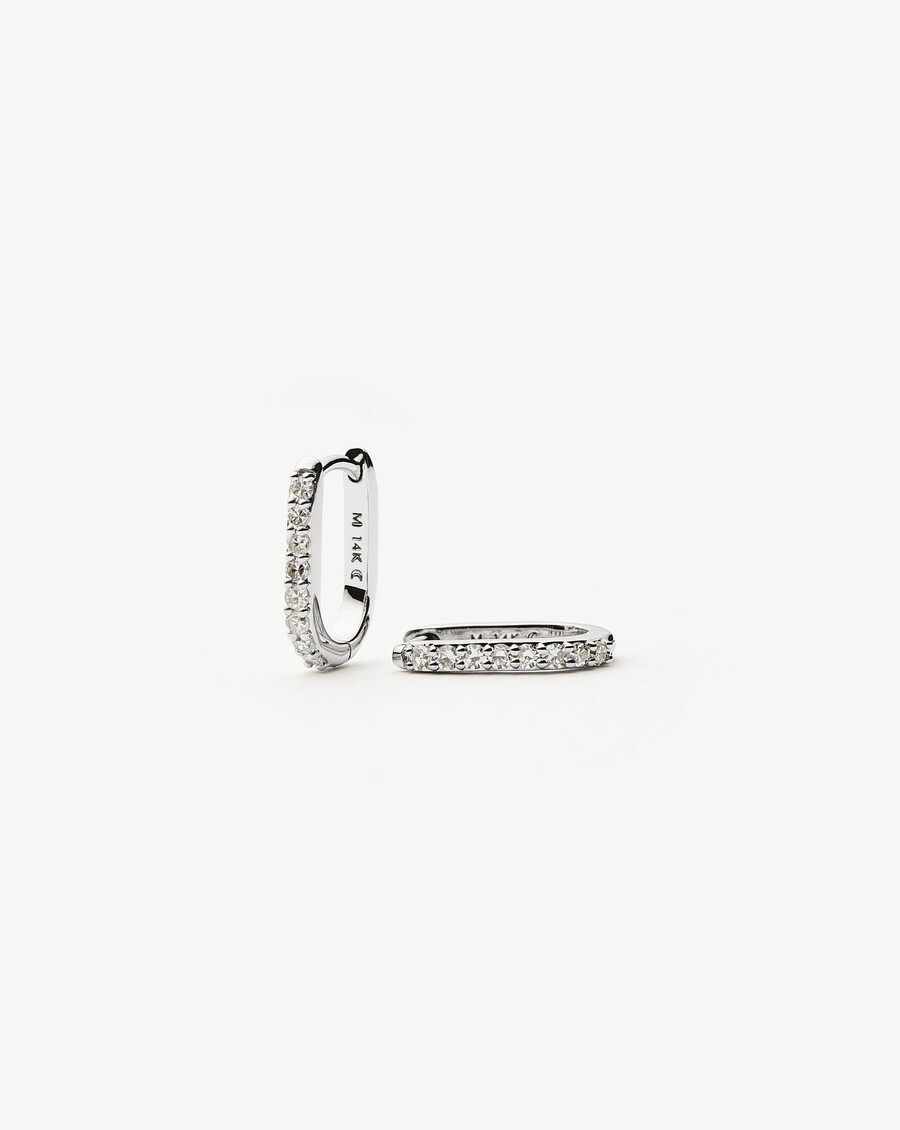 aros mini ovalados con diamantes en oro blanco macizo de 14 k