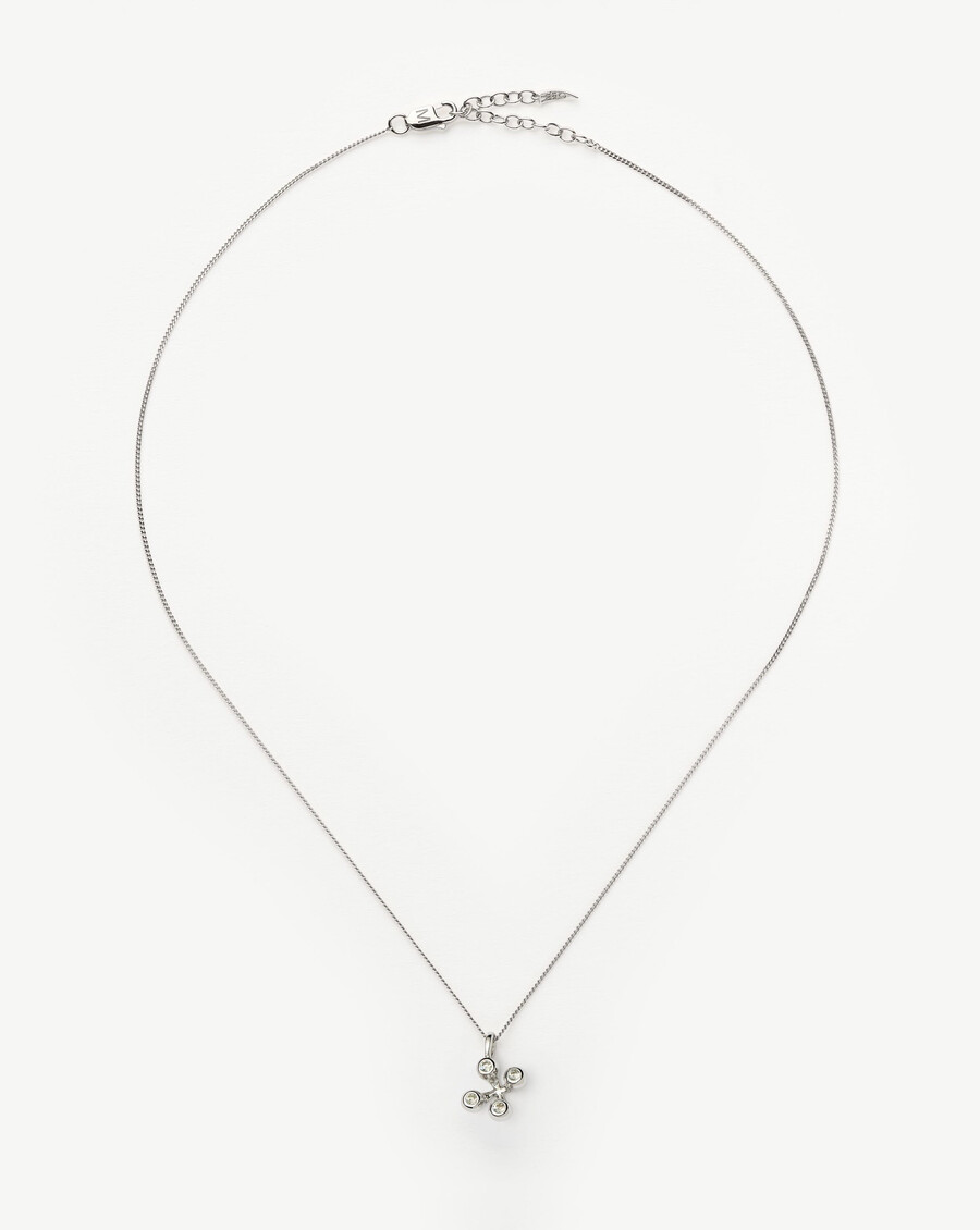 collar con colgante de átomo