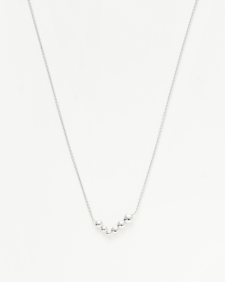 collar flotante de cuentas