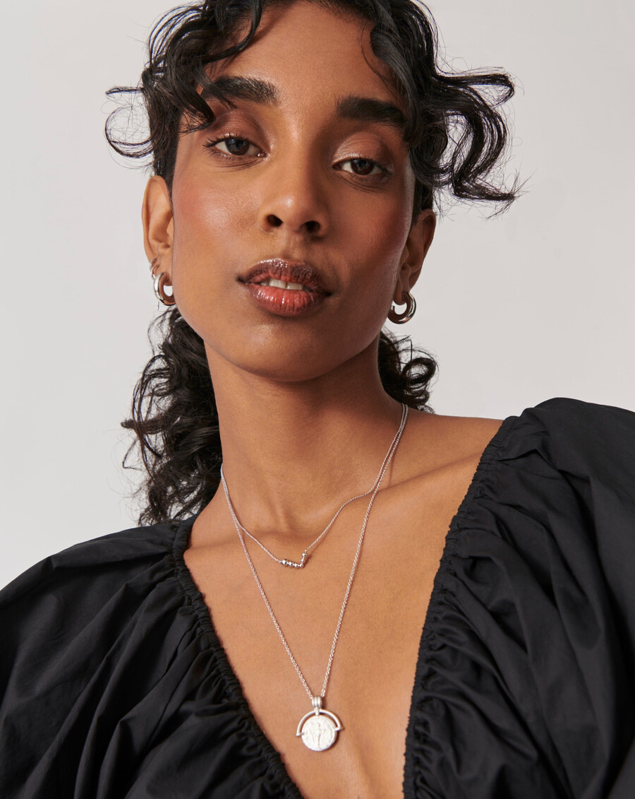 collar flotante de cuentas