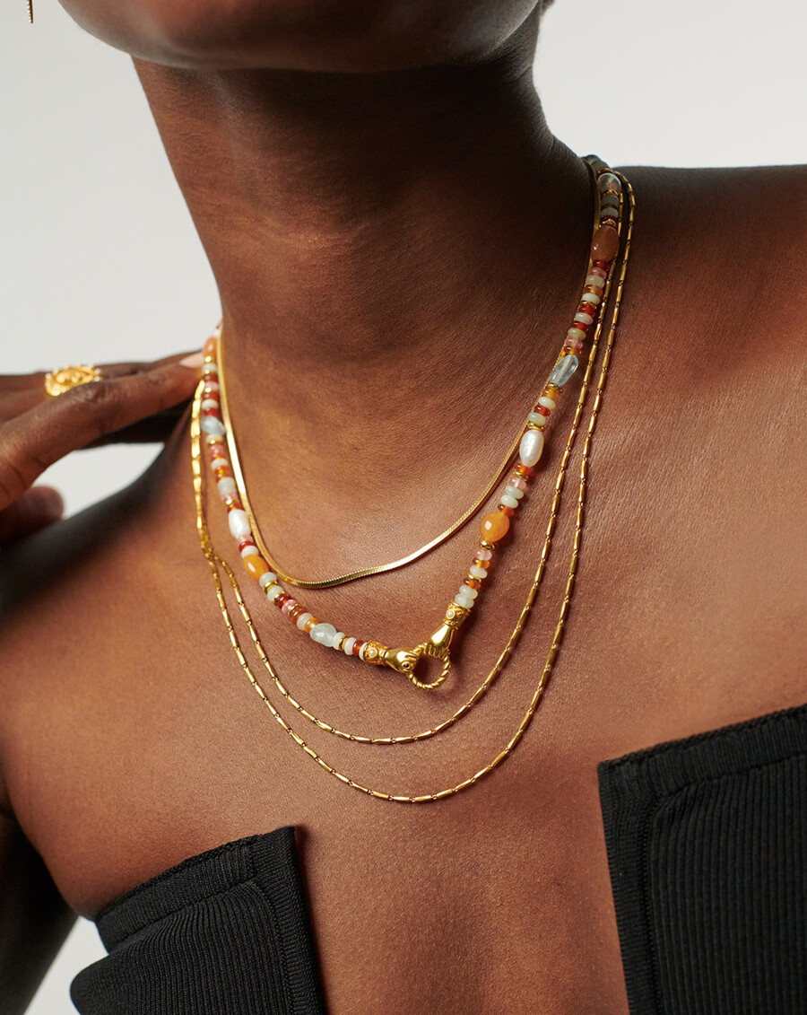 collar de oro con piedras preciosas y cuentas harris reed en buenas manos