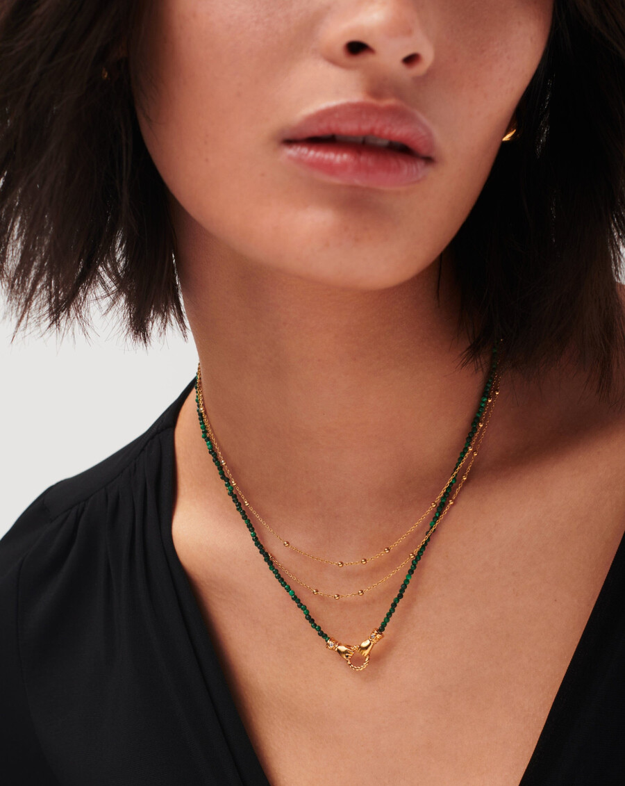 collar de oro con piedras preciosas y cuentas pequeñas en buenas manos de harris reed