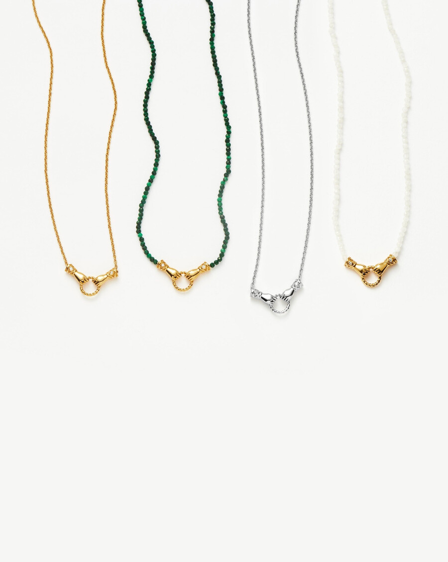 collar de oro con piedras preciosas y cuentas pequeñas en buenas manos de harris reed