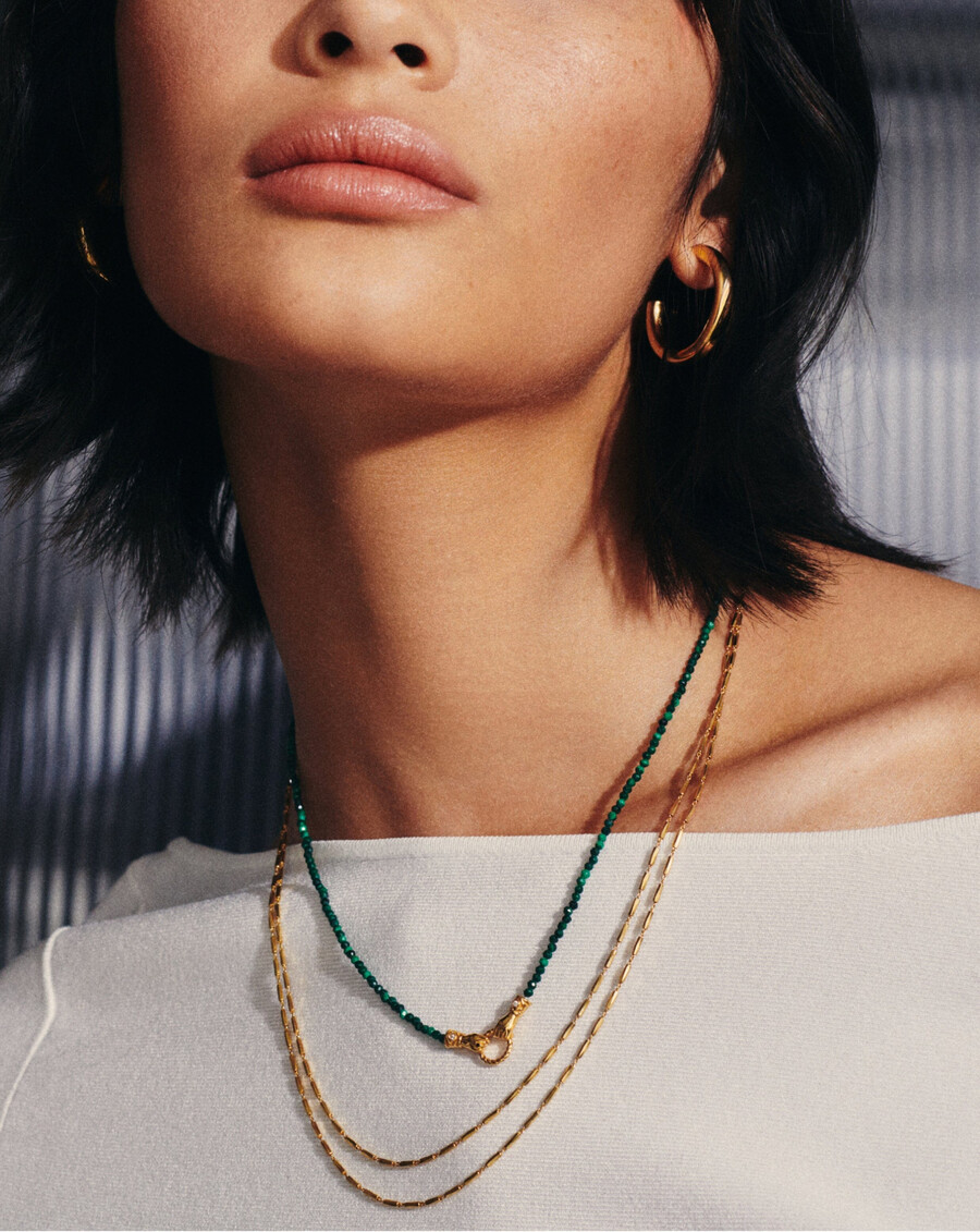 collar de oro con piedras preciosas y cuentas pequeñas en buenas manos de harris reed