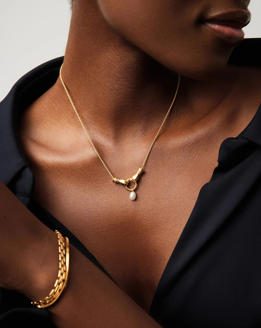 collar con colgante de gota en buenas manos de harris reed