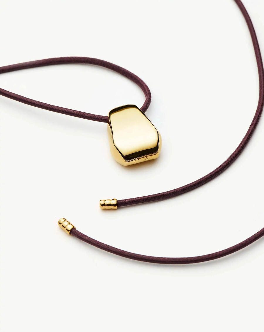 collar de cordón arco grabable de lucy williams - oro