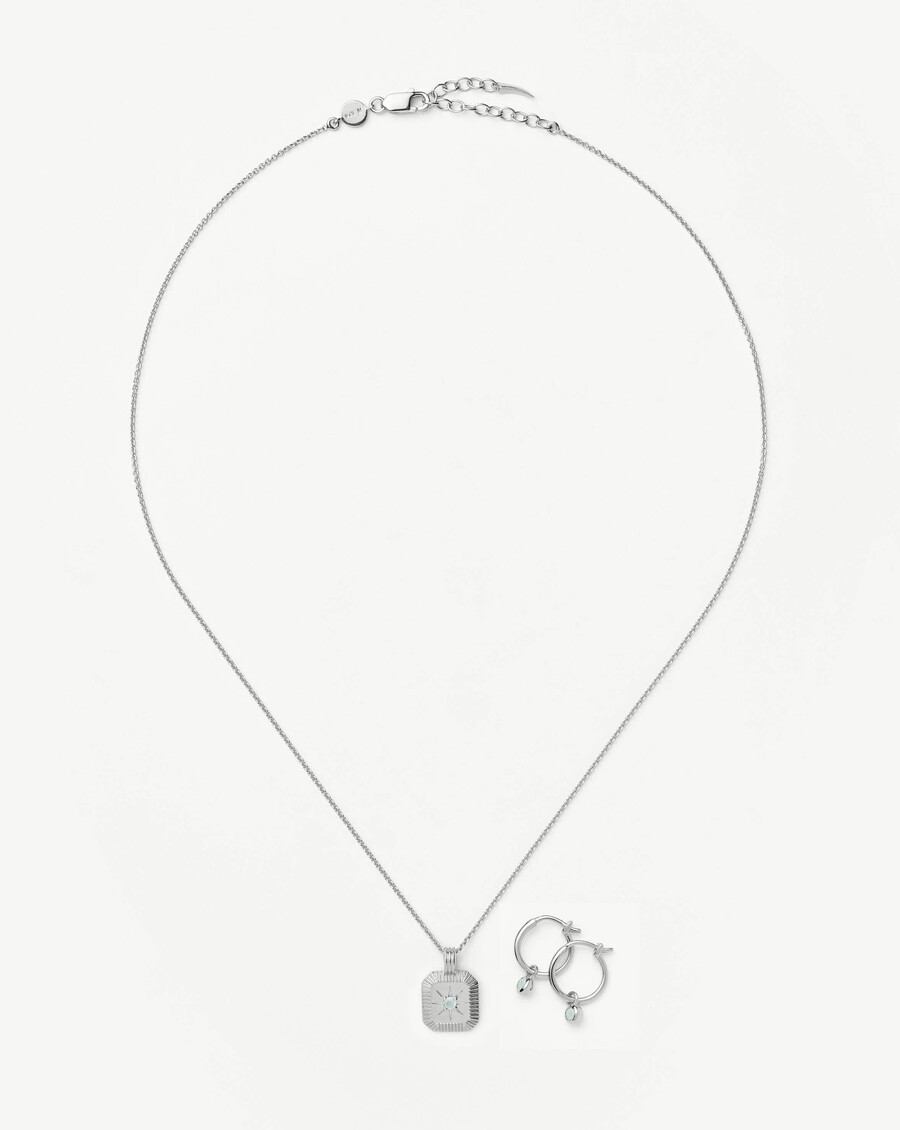 conjunto de collar y pendientes con dijes de piedra natal de marzo - plata