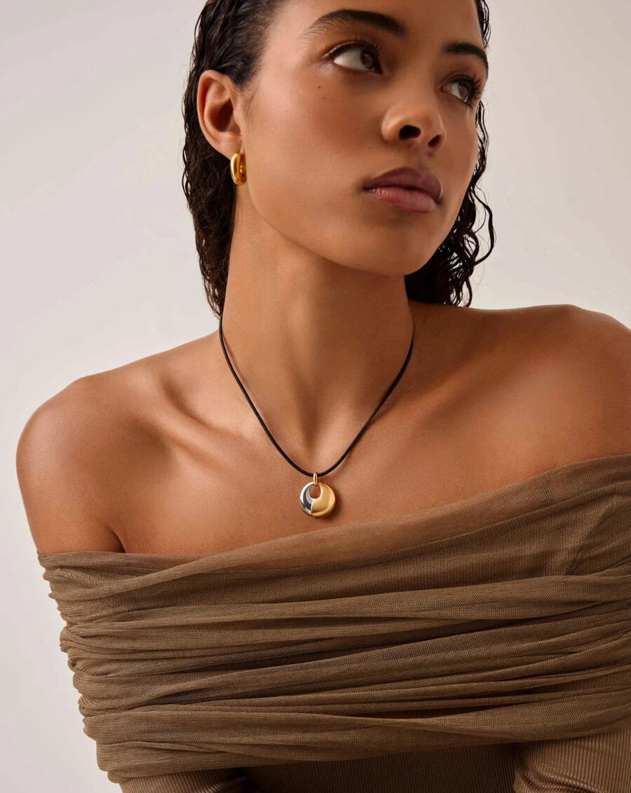 conjunto de collar con colgante de guijarro escultural