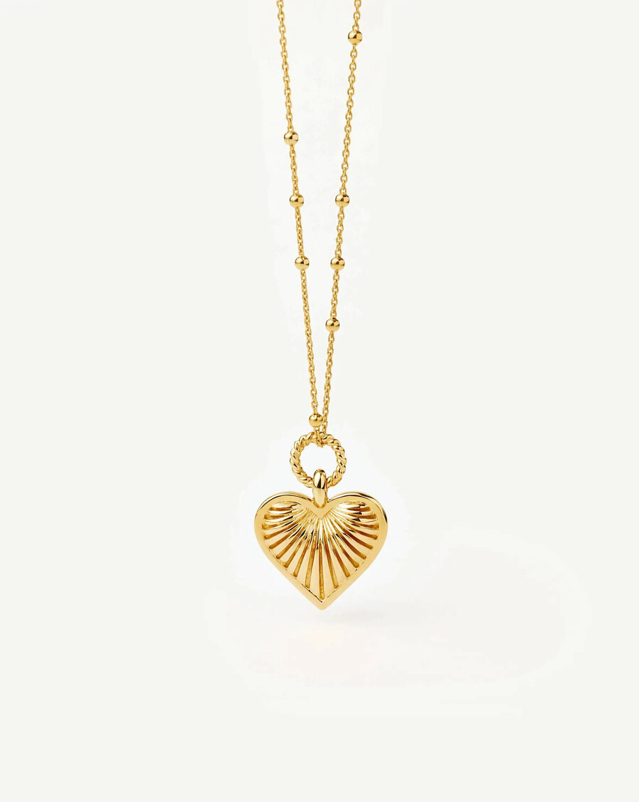 collar con dije de corazón de cresta