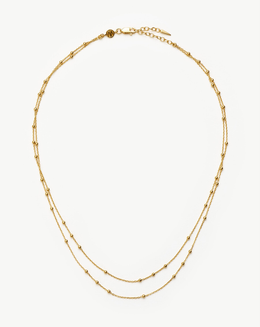collar de oro con doble cadena