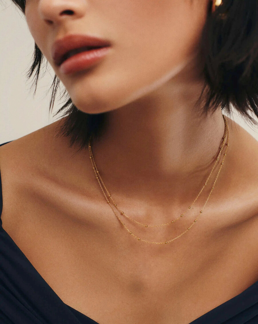 collar de oro con doble cadena