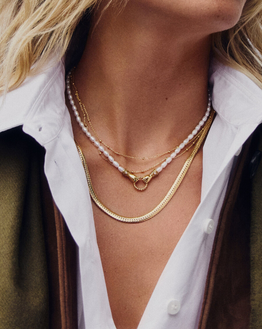 collar de oro con doble cadena