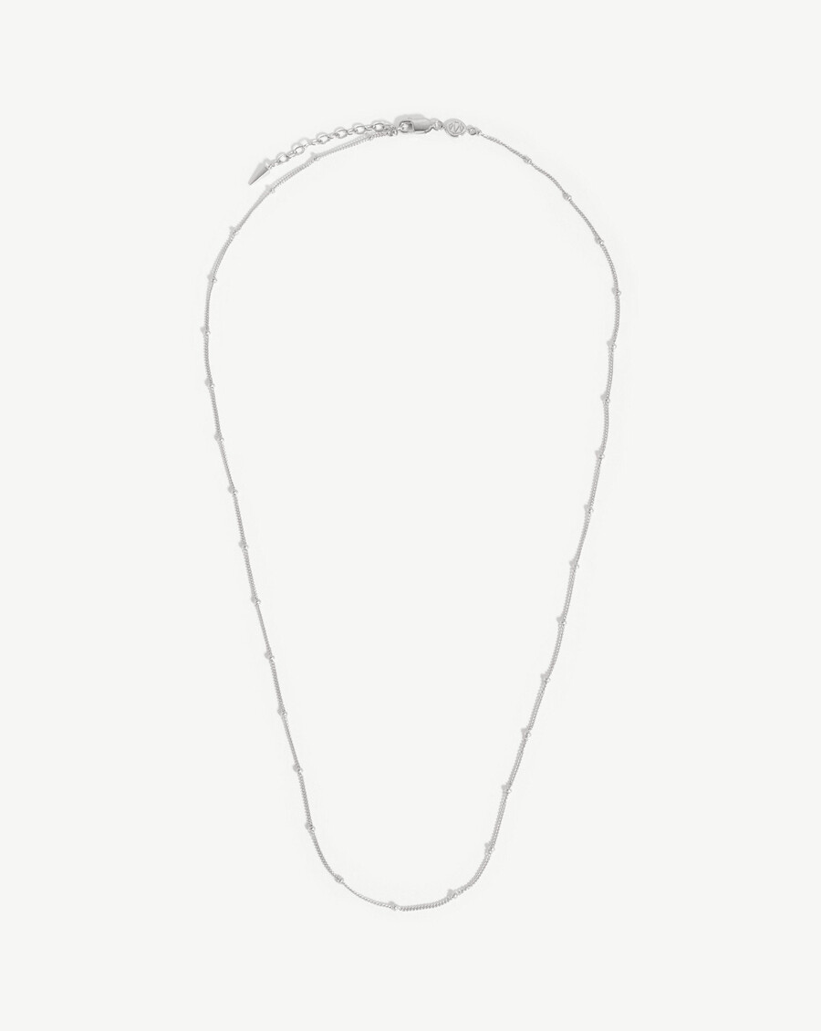 collar de cadena larga con borlas