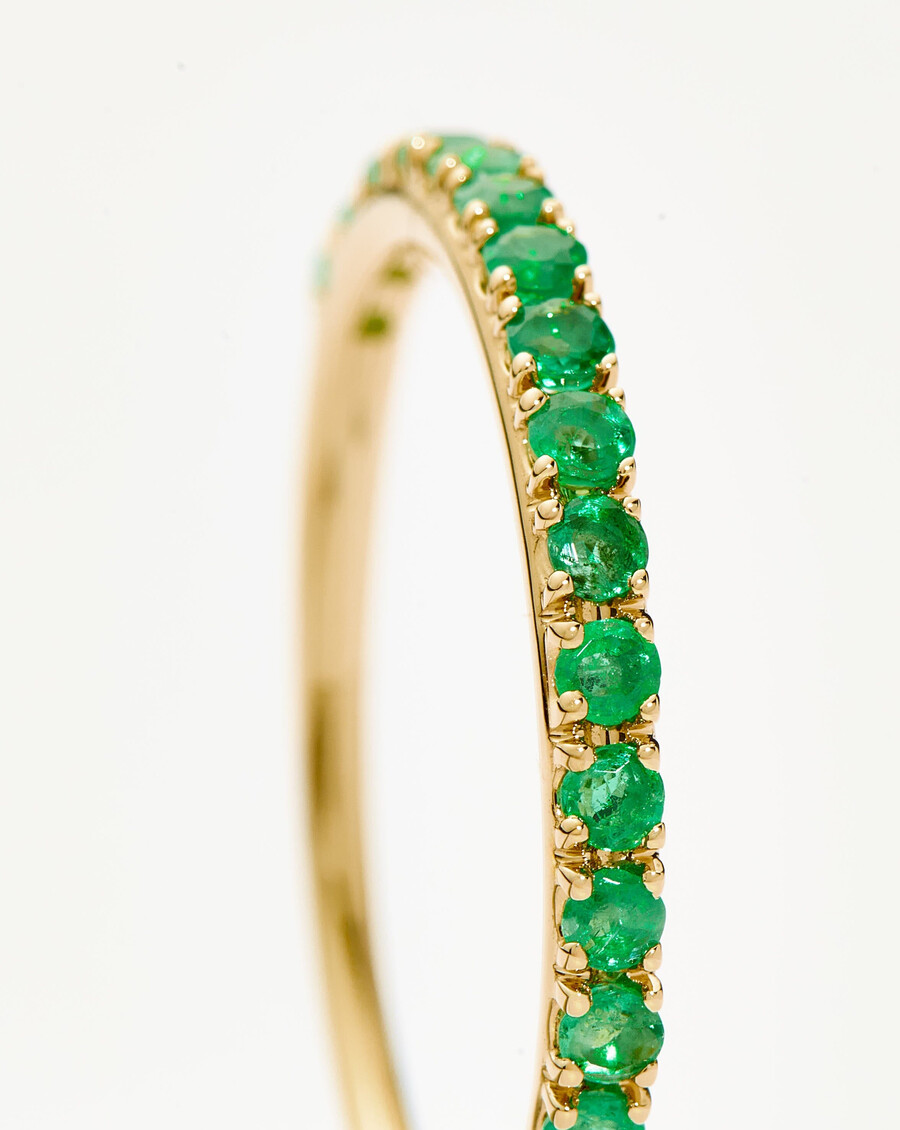 anillo de eternidad de media esmeralda en oro macizo de 14 k