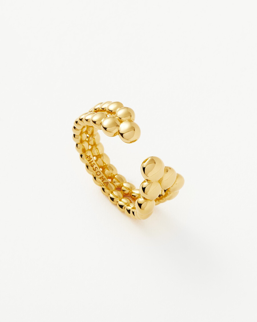anillo abierto con cuentas