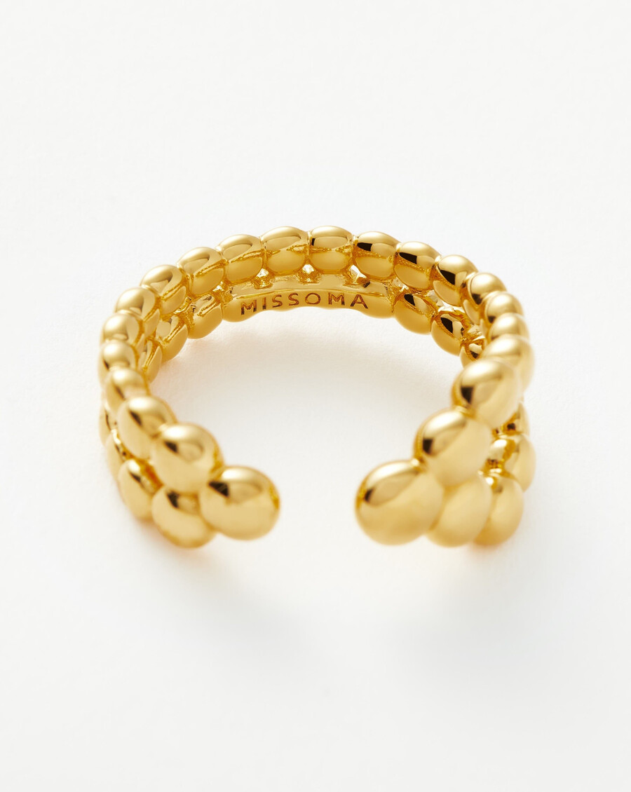 anillo abierto con cuentas